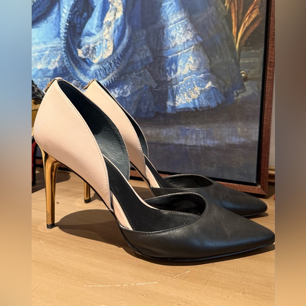 Calvin Klein Black and Gold D'Orsay Pointed-Toe Pumps